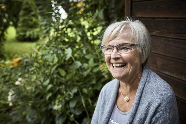 Woman laughing in nature